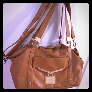 Roomy Tan slouchy purse with convertible straps